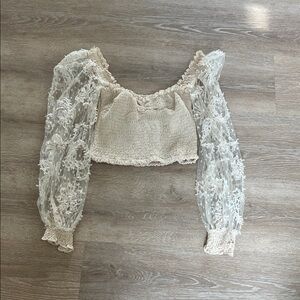 Sheer Lace Long-Sleeve Smocked Crop Top in Cream